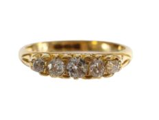 An Edwardian 18ct gold and diamond ring