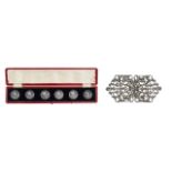 A cased set of six Edward VII silver buttons, and a silver belt buckle