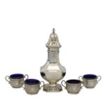 A George V silver sugar caster and a set of four Victorian silver salts