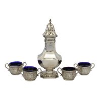 A George V silver sugar caster and a set of four Victorian silver salts