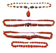 A small collection of cherry amber beads