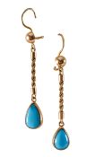 A pair of turquoise drop earrings