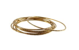 A collection of chased bangles