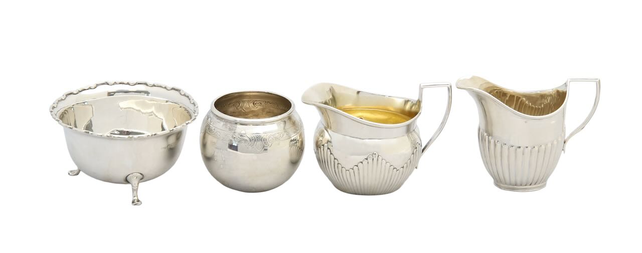 Two Victorian silver cream jugs and two silver bowls