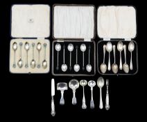 A collection of silver flatware
