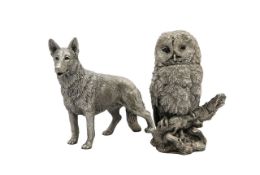 Two silver models, of an owl and a dog
