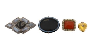 A collection of hard stone brooches and heart pendant