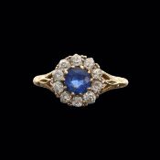 A sapphire and diamond-set ring