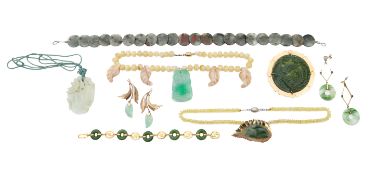 A collection of jade pendants and other