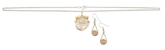 A silver coin from the ship Atocha 1622 and ear ring