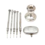 Five Sampson Mordan silver propelling pencils, a dwarf candlestick and a double sovereign holder