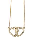 An 18ct gold and diamond set double heart pendant