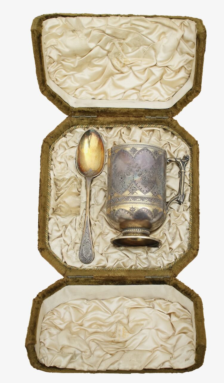 A cased Victorian silver gilt Christening mug and spoon
