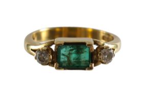 An 18ct gold, emerald and diamond ring