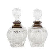 Two Edward VII silver mounted cut glass perfume bottles
