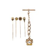 A 9ct gold watch fob chain, and four gold stick pins