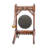 A Victorian oak Gothic Revival dinner gong