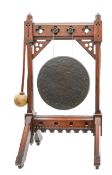 A Victorian oak Gothic Revival dinner gong