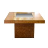 An Art Deco style walnut veneer pedestal table