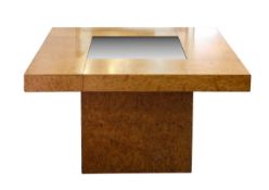 An Art Deco style walnut veneer pedestal table