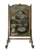 A gilt and gesso silk firescreen