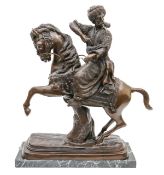 A large bronze figure group of an Ottoman on horseback
