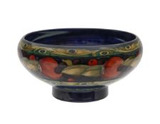 A William Moorcroft 'Banded Pomegranate' pottery bowl