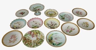 A group of twelve hand-painted porcelain plates, and a comport