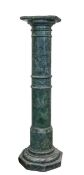 A serpentine green marble column