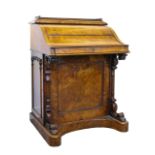 A Victorian burr walnut piano-top Davenport desk
