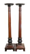 A pair of William IV or early Victorian mahogany jardiniere stands