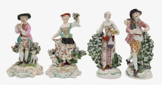 Two pairs of 18th century porcelain figures