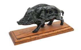 A painted bronze of a wild boar