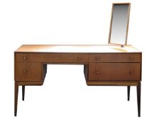 McIntosh & Co. Ltd: A teak dressing table and a stool