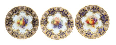 A group of three Royal Worcester porcelain painted fruit cabinet plates