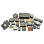 A collection of nineteen Russian lacquer boxes and a hanging decoration