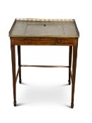 A mahogany and leather inset writing desk
