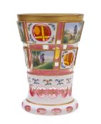 A Bohemian enamelled cranberry glass vase