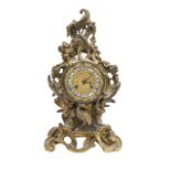A French Rococo style gilt metal mantel clock