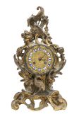 A French Rococo style gilt metal mantel clock