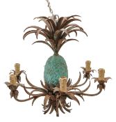 A Hollywood Regency style toleware pineapple chandelier