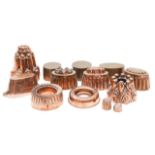 Thirteen Victorian copper jelly moulds