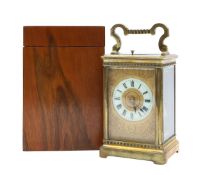 A brass repeater carriage clock