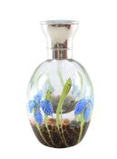 A silver and enamel perfume bottle