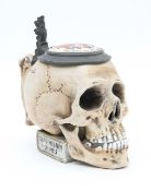 A German porcelain student stein, in the form of a skull