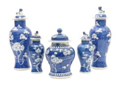 Five Chinese blue and white porcelain vases and covers