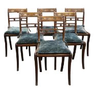 A set of six Regency mahogany dining chairs