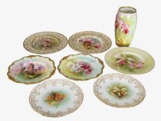 A group of seven Royal Doulton porcelain plates, and a Royal Doulton vase,
