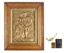 A collection four of gilt and relief decorated plaques