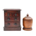 A Victorian mahogany apprentice chest of drawers, and a treen cup and cover